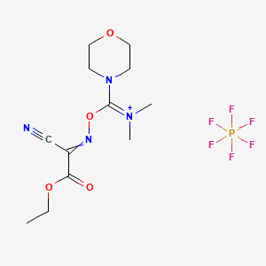 4-(6-Cyano-2-methyl-7-oxo-4,8-dioxa-2,5-diazadec-5-en-3-ylidene)morpholin-4-ium hexafluorophosphate(V) chemical structure (CAS 1075198-30-9)