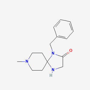 1-Benzyl-8-methyl-1,4,8-triazaspiro[4.5]decan-2-one chemical structure (CAS 1224591-33-6)