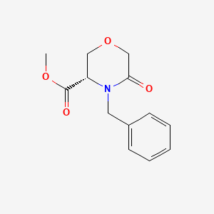 Methyl (S)-4-Benzyl-5-oxomorpholine-3-carboxylate chemical structure (CAS 1235181-00-6)
