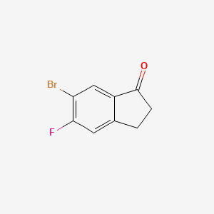 6-Bromo-5-fluoro-2,3-dihydro-1H-inden-1-one chemical structure (CAS 1273595-81-5)