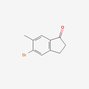 5-Bromo-6-methyl-2,3-dihydro-1H-inden-1-one chemical structure (CAS 1273655-83-6)