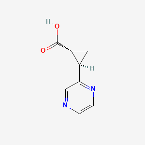 rel-(1R,2R)-2-(Pyrazin-2-yl)cyclopropane-1-carboxylic acid chemical structure (CAS 1287206-26-1)