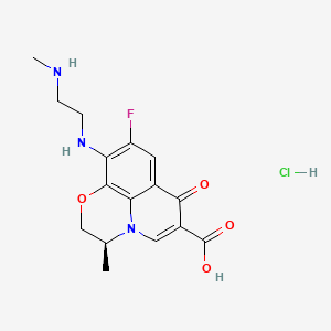 (S)-9-Fluoro-3-methyl-10-((2-(methylamino)ethyl)amino)-7-oxo-3,7-dihydro-2H-[1,4]oxazino[2,3,4-ij]quinoline-6-carboxylic acid hydrochloride chemical structure (CAS 1346603-62-0)