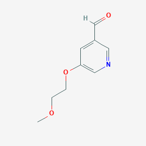 5-(2-Methoxyethoxy)pyridine-3-carbaldehyde chemical structure (CAS 1596694-71-1)