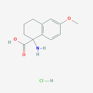 1-Amino-6-methoxy-1,2,3,4-tetrahydronaphthalene-1-carboxylic acid hydrochloride chemical structure (CAS 1803584-43-1)