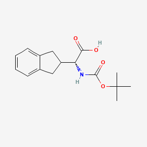 (R)-2-((tert-Butoxycarbonyl)amino)-2-(2,3-dihydro-1H-inden-2-yl)acetic acid chemical structure (CAS 181227-48-5)