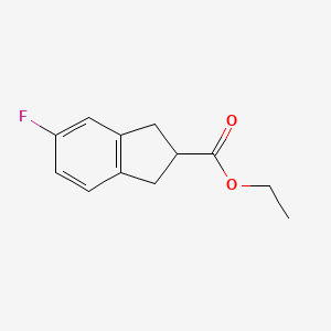 Ethyl 5-fluoro-2,3-dihydro-1H-indene-2-carboxylate chemical structure (CAS 1823383-20-5)
