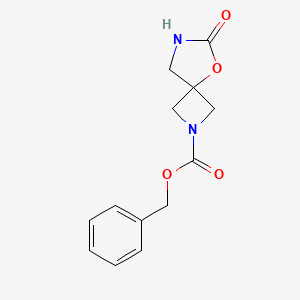 Benzyl 6-oxo-5-oxa-2,7-diazaspiro[3.4]octane-2-carboxylate chemical structure (CAS 1935064-61-1)