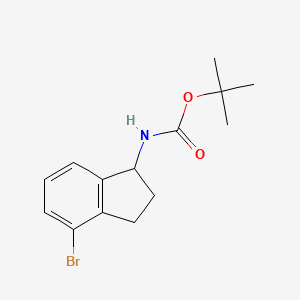 tert-Butyl (4-bromo-2,3-dihydro-1H-inden-1-yl)carbamate chemical structure (CAS 2167214-26-6)