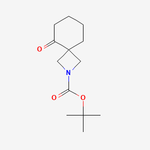 tert-Butyl 5-oxo-2-azaspiro[3.5]nonane-2-carboxylate chemical structure (CAS 2306272-86-4)