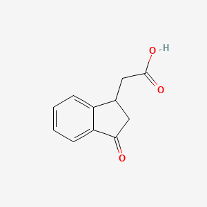 2-(3-Oxo-2,3-dihydro-1H-inden-1-yl)acetic acid chemical structure (CAS 25173-12-0)