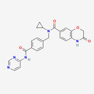 N-Cyclopropyl-3-oxo-N-(4-(pyrimidin-4-ylcarbamoyl)benzyl)-3,4-dihydro-2H-benzo[b][1,4]oxazine-7-carboxamide chemical structure (CAS 2561494-77-5)