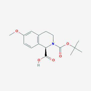 (R)-2-(tert-Butoxycarbonyl)-6-methoxy-1,2,3,4-tetrahydroisoquinoline-1-carboxylic acid chemical structure (CAS 2703746-30-7)