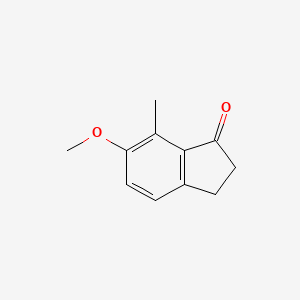 6-Methoxy-7-methyl-2,3-dihydro-1H-inden-1-one chemical structure (CAS 28596-75-0)