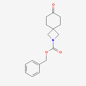 Benzyl 7-oxo-2-azaspiro[3.5]nonane-2-carboxylate chemical structure (CAS 2940937-83-5)