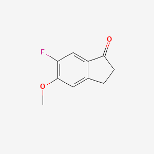 6-Fluoro-5-methoxy-2,3-dihydro-1H-inden-1-one chemical structure (CAS 295779-82-7)