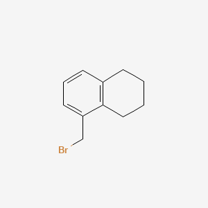 5-(Bromomethyl)-1,2,3,4-tetrahydronaphthalene chemical structure (CAS 33079-29-7)