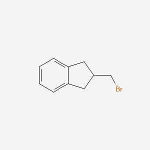 2-(Bromomethyl)-2,3-dihydro-1H-indene chemical structure (CAS 348080-87-5)