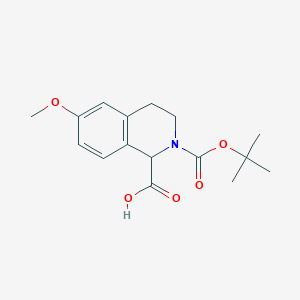 2-(tert-Butoxycarbonyl)-6-methoxy-1,2,3,4-tetrahydroisoquinoline-1-carboxylic acid chemical structure (CAS 499139-27-4)