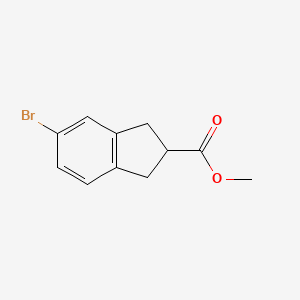 Methyl 5-bromo-2,3-dihydro-1H-indene-2-carboxylate chemical structure (CAS 628732-09-2)