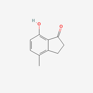 7-Hydroxy-4-methyl-2,3-dihydro-1H-inden-1-one chemical structure (CAS 67901-82-0)