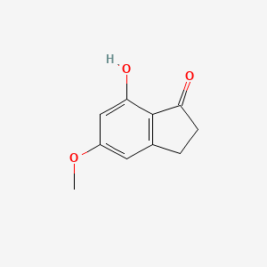 7-Hydroxy-5-methoxy-2,3-dihydro-1H-inden-1-one chemical structure (CAS 76842-70-1)