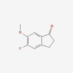 5-Fluoro-6-methoxy-2,3-dihydro-1H-inden-1-one chemical structure (CAS 83802-71-5)
