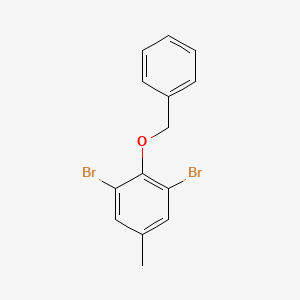 2-(Benzyloxy)-1,3-dibromo-5-methylbenzene chemical structure (CAS 84379-34-0)
