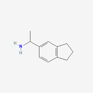 1-(2,3-Dihydro-1H-inden-5-yl)ethan-1-amine chemical structure (CAS 877-51-0)