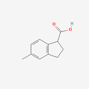 5-Methyl-2,3-dihydro-1H-indene-1-carboxylic acid chemical structure (CAS 956101-02-3)